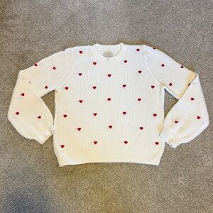 White Sweater with Red Heart Accents